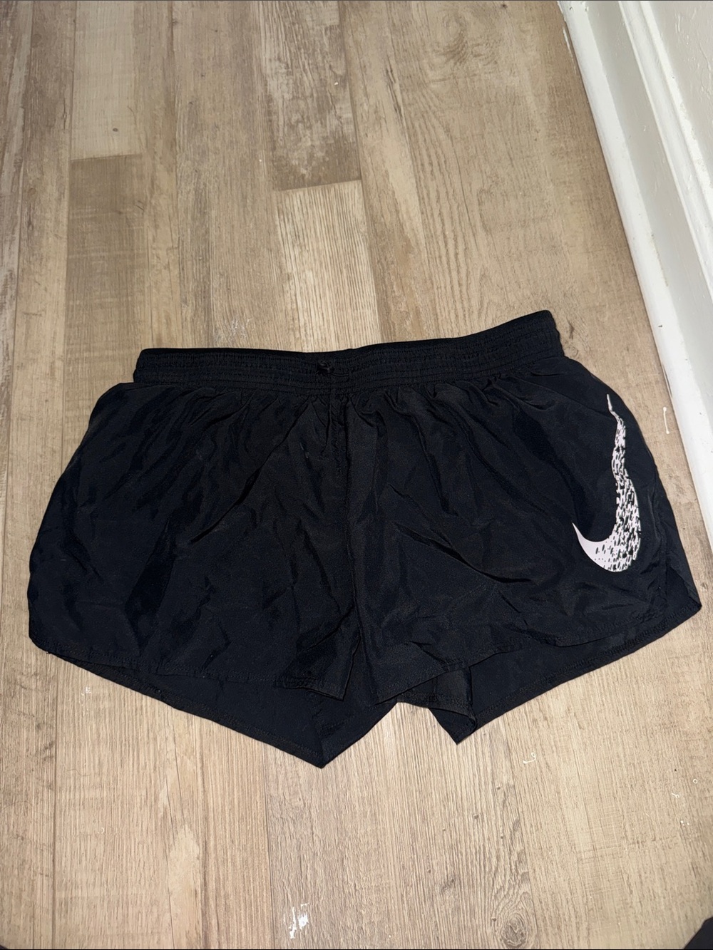 Nike Black Women’s Athletic Shorts with White Swoosh